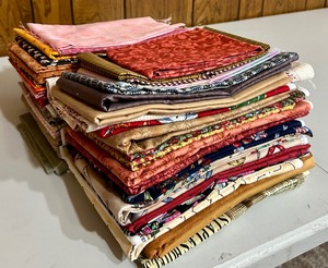 lot 160 image: Three Stacks of Sewing Pieces and Remnants
