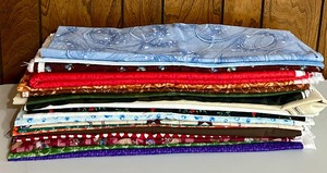 lot 151 image: Vibrant Sewing Remnants and Pieces
