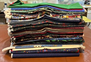 lot 242 image: Large Stack of Fine Fabric