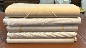 lot 255 image: Bolts of Permanent Press Muslin, Broadcloth, Cotton and More