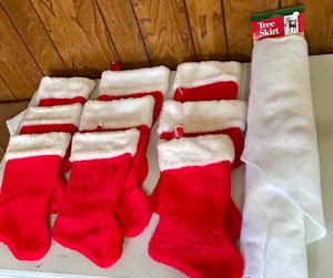 lot 239 image: Nine New Christmas Stockings and Tree Skirt for Crafting