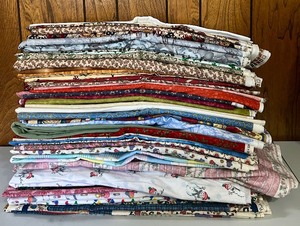 lot 234 image: Large Remnants  Yardage of Fabric in Great Patterns For Every Project
