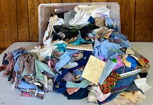 lot 230 image: Great Selection of Fabric Scraps in a Large Bin for Sewing Projects