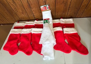 lot 225 image: Ten New Christmas Stockings and Two Tree Skirts