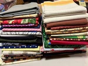 lot 322 image: Two Stacks of Beautiful Fabric Remnants in a Variety of Colors and Sizes