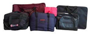 lot 398 image: Variety of Small Through Large Luggage In Pink, Black and Maroon
