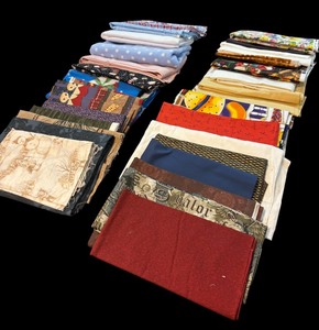 lot 394 image: Fun Large Fabric Remnants in Muted Colors and Patterns
