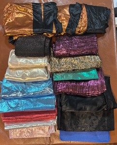 lot 391 image: Lot of Medium and Small Satin and Glitzy Fabric Remnants