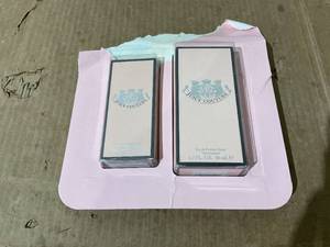 lot 284 image: 2PCS Juicy Couture Eau De Parfum Spray 1.7 Oz and 1 oz Size