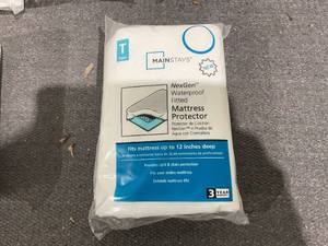 lot 333 image: LOT OF 10 Mainstays Waterproof EVA Fitted Mattress Protector, Twin