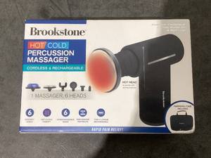lot 702 image: Brookstone Cordless Hot and Cold Percussion Deep Tissue Massager Gun