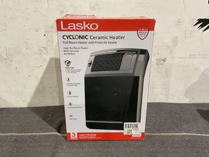 lot 320 image: Lasko 1500W Cyclonic Ceramic Console Electric Space Heater with Timer, CC24925, Black