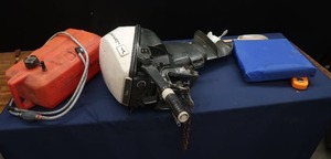 lot 60 image: 9.5 HP JOHNSON BOAT MOTOR, GAS TANK WITH PRIMER BALL AND CONNECTORS AND MORE