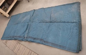 lot 64 image: HEAVY DUTY FLAME RETARDANT NEOPRENE COATED LARGE MESH TARP WITH GROMMETS