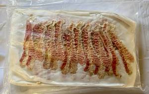 lot 102 image: 3.75lbs Pre Cooked Bacon-12 slices per sheet-25 sheets