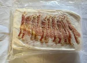 lot 106 image: 3.75lbs Pre Cooked Bacon-12 slices per sheet-25 sheets