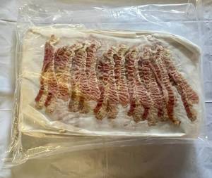 lot 107 image: 3.75lbs Pre Cooked Bacon-12 slices per sheet-25 sheets