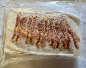 lot 108 image: 3.75lbs Pre Cooked Bacon-12 slices per sheet-25 sheets