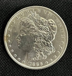 lot 3 image: 1886-P Morgan Silver Dollar AU