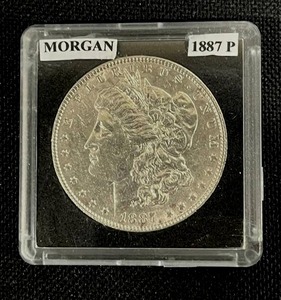 lot 19 image: 1887-P Morgan Silver Dollar (Sealed) EF