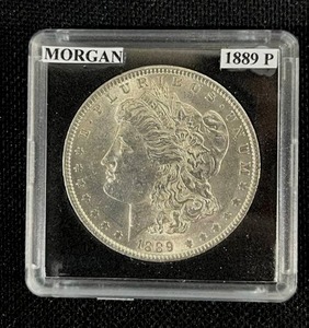 lot 21 image: 1889-P Morgan Silver Dollar (Sealed) EF