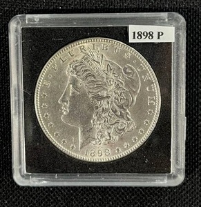 lot 26 image: 1898-P Morgan Silver Dollar (Sealed) AU