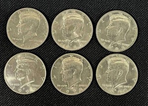 lot 38 image: Six Kennedy Half Dollars 1972, 1973, 1983, 1983, 1988, and 1992
