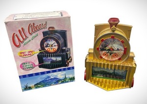 lot 54 image: All Aboard Steam Engine Table Style Alarm Clock (7.5 Tall)