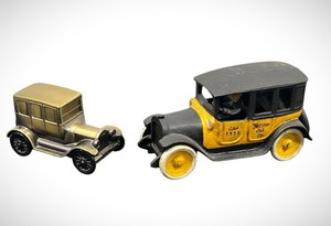 lot 61 image: Antique Arcade Yellow Cab Toy Taxi Car (Cast Iron) and Die Cast 1926 Ford Model Car