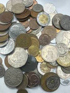 lot 22 image: Over 1 Pound Unsearched Foreign Coins
