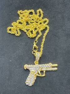 lot 26 image: Pistol Necklace