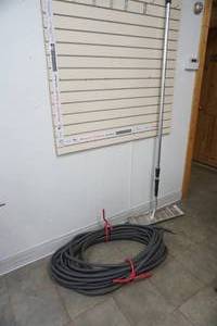 lot 84 image: No Sale Lot garden hose & snow rake