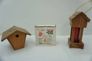 lot 97 image: 2 bird feeders & pail and bird bath de-ice