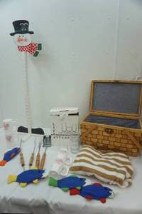 lot 133 image: No Sale Lot sweater, glasses (10 tall, 6 short), picnic basket (mugs, BBQ utensils), and snowman card holder