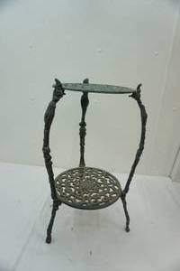 lot 10 image: iron decorative table 2 tall 1 wide