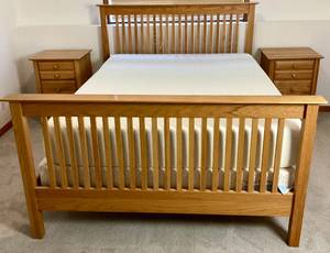 lot 22 image: Amish Made Queen Headboard & Footboard plus Two 3 Drawer Nightstands Modern Furniture Mfg. The Board Store