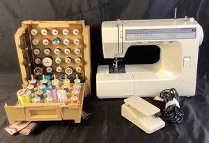 lot 59 image: Kenmore 10 Sewing Machine with Foot Pedal and Accessories