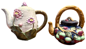 lot 58 image: Two Ceramic Teapots Including A Majolica Style Grape Motif Teapot