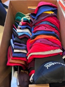 lot 99 image: 10 Boxes of Baseball Caps (See All Photos)