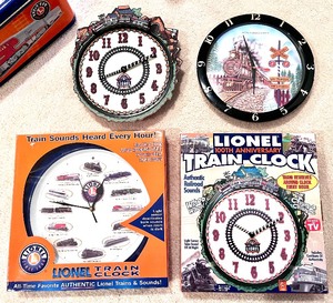 lot 27CL image: Lionel Clocks & Tin including Lionel Train Wall Clock