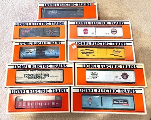 lot 20 image: (9) Lionel Electric Train Cars including Lionel Burlington Gondola Train Car, Lionel Hormel Billboard Reefer Train Car & More