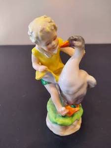 lot 27 image: Vintage Royal Worcester Goosie Goosie Gardener Figurine