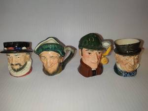 lot 36 image: Four Royal Doulton Small Mugs