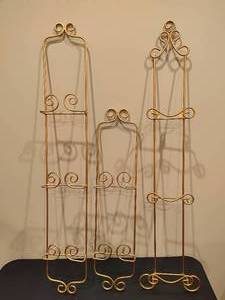 lot 140 image: Three Gold-Tone Hanging Plate Holders