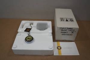 lot 12 image: Franklin Mint John Deere Tractor Pocket Watch Model R