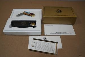 lot 16 image: Franklin Mint Farmall Tractor Folding Knife Model H