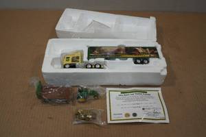 lot 20 image: Ertl John Deere and Thomas Kinkade 164 Die-Cast Kenworth Semi & Trailer with Tractor and Haywagon