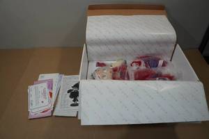 lot 36 image: Danbury Mint Red Hot Betty is a Red Hat Lady
