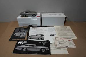 lot 37 image: Danbury Mint The James Bond 007 Aston Martin 124 Die-Cast Model