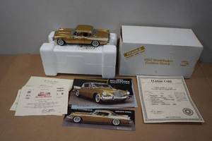 lot 44 image: Danbury Mint 1957 Studebaker Golden Hawk Die-Cast Model